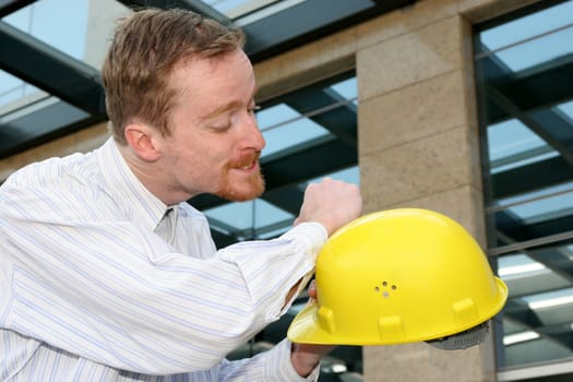 Details an successful architect cleaning helmet