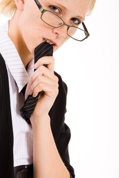 business woman with a pair of glasses eating her necktie