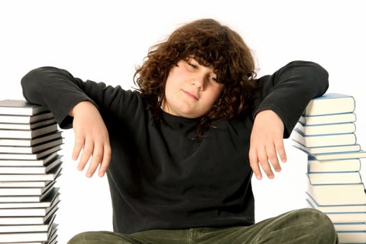 boy unhappy and many books on white background