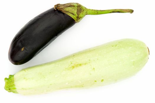 vegetable marrow and eggplant on a white background