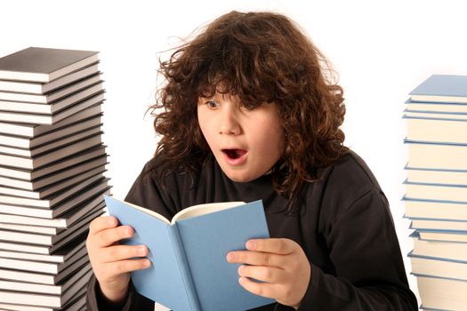 boy surprised and many books on white background