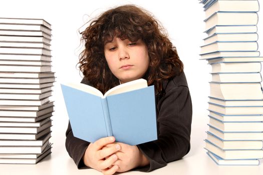 boy reading a book and many books on white background