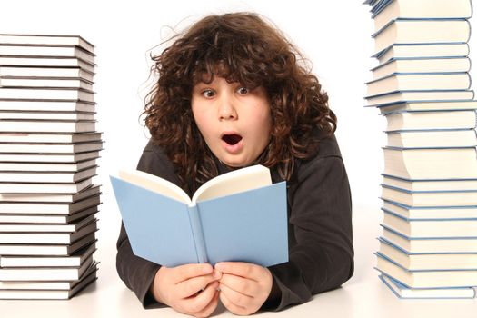 boy surprised and many books on white background