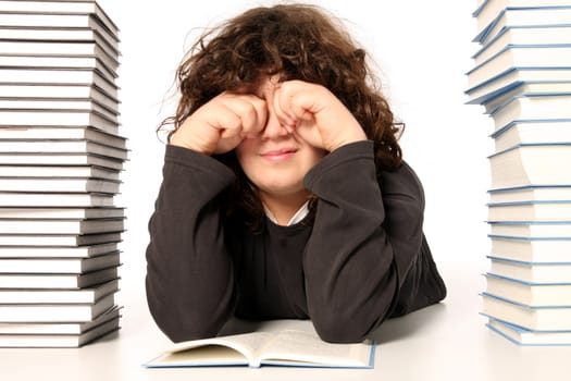 boy crying and and many books on white background
