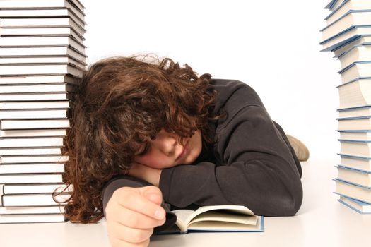 boy sleeping and and many books on white background