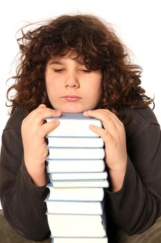 boy unhappy and many books on white background