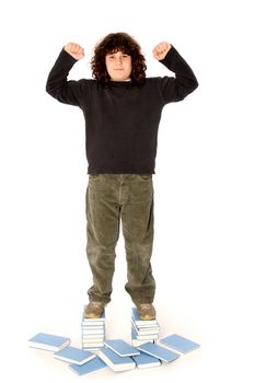 boy on stack of books on white background