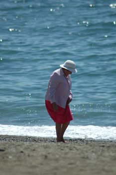 Woman walking on the beach