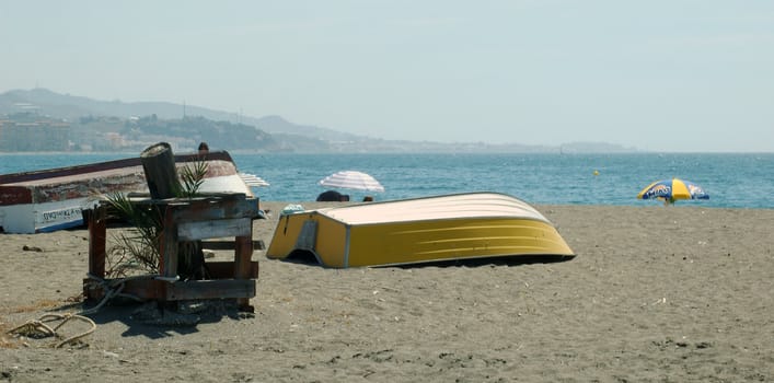 Beach with boat in Costa del Sol, Spain