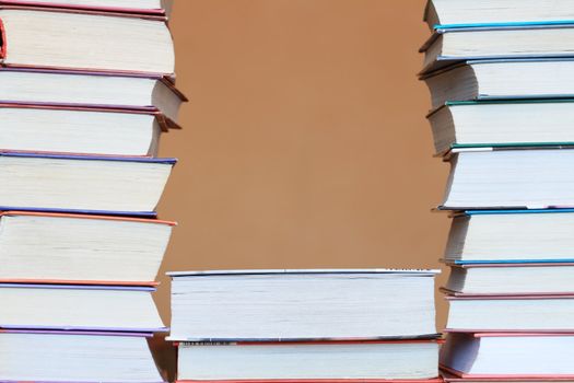 Closeup of stacks of books with copy space