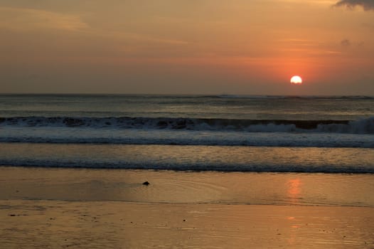 Sunset in Kuta, Bali, Indonesia.