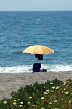 Beach with umbrellas in Andalusia, Spain