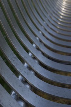 a bench in Kelso close to the river, closeup of the metal construction