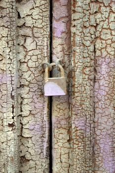 Gates old house with a padlock