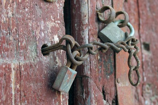 Gates old house with a padlock