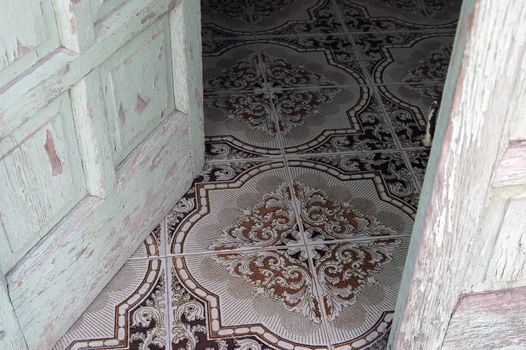 Details of the entrance of a house in ruins