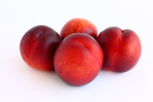 Fresh, colorful ripe nectarines, isolated