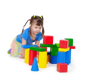 Child playing with toys isolated on white background