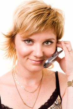 smiling woman with mobile phone on a white background