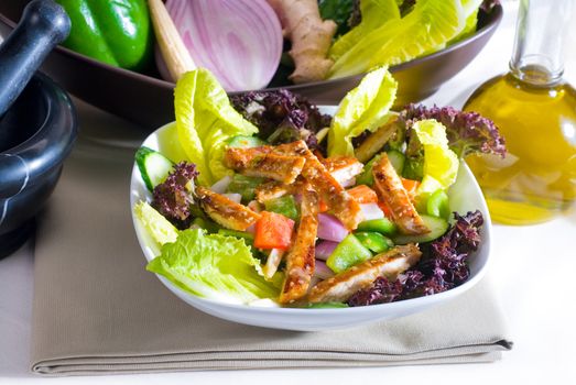 fresh colorfull sesame chicken salad close up