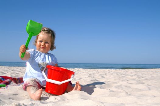 baby girl on the beach