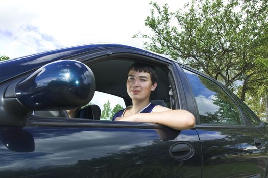 19th years old man driver in a car