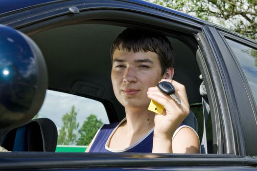 Young man just passed driving test 