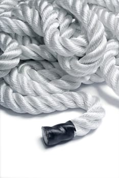 Detail of a twisted nylon rope focus on the end
