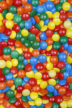 Close-up background of multi colored chocolate candy