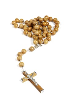Beautiful handmade rosary cross made of silver and wood - main focus on jesus on the cross