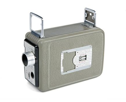 Retro movie camera for 8mm film isolated on white background