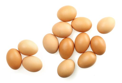 Brown chicken eggs isolated on white background