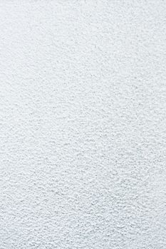 Flat background surface completely covered in frozt and snow