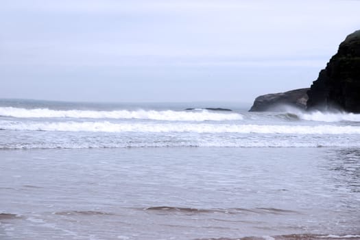 a view of the beach cliffs in ballybunion co kerry ireland on a stormy winter