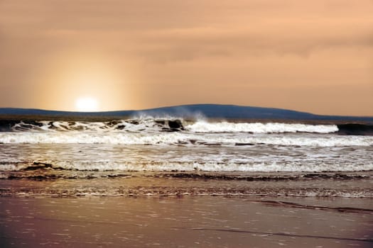 sweeping spraying waves during a storm of the west coast of ireland