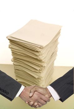 Paper Stack and bussiness men hands