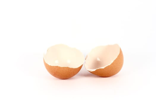 Broken egg shell on white background