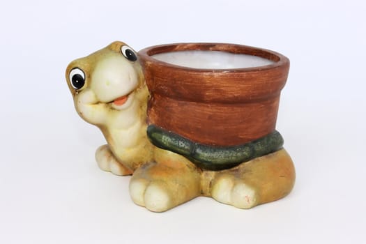 turtle, container of clay for flowers, isolated