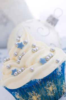 Closeup of a cupcake with a winter theme