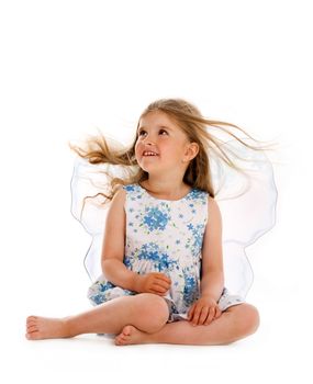 Isolated baby girl with long hair untwisted and fairy wings