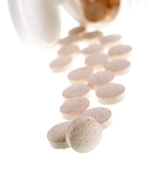 Tablets  ,Pills Spilling out of Pill Bottle closeup