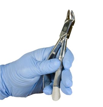 dental pliers held by rubber glove isolated with clipping path