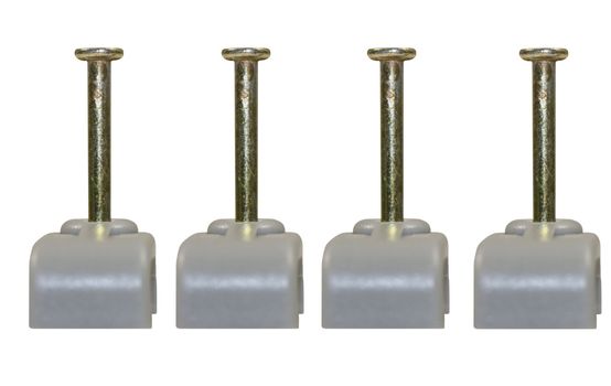 Electrical cable or wire clips in grey, isolated on a white background
