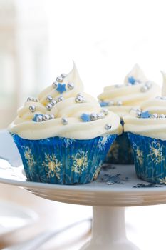 Cupcakes with a winter theme, on a cakestand