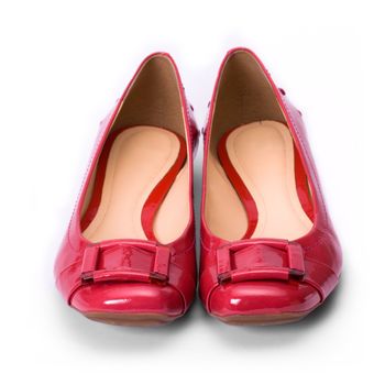 Shiny red shoes against a white background
