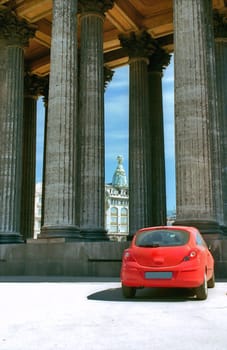 Classical porticos and red car