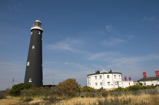 The old black lighthouse at Dungeness, Kent