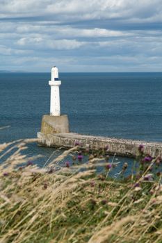 Lighthouse against a stormy sky