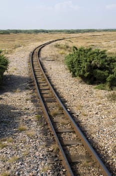 The rail tracks of a miniature steam railway