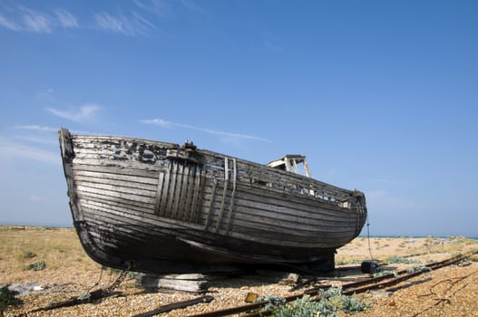 An old fishing boat on the beach at Dungeness